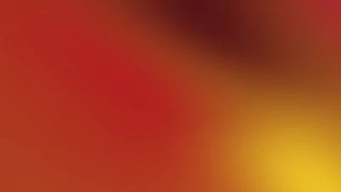 Blurred abstract gradient depicts red, gold, and brown hues. Stock Footage 320652929