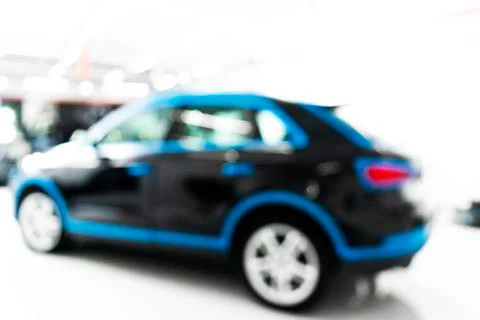 Blurred abstract image of man worker with car in body shop. Blur car auto ser Foto stock