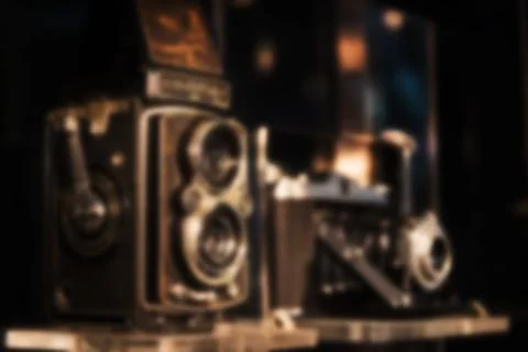 Blurred abstract image of old camera Stock Photos