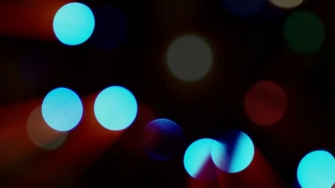 Blurred abstract moving lights Bokeh effect. Christmas tree. 4K background Stock Footage 77972041