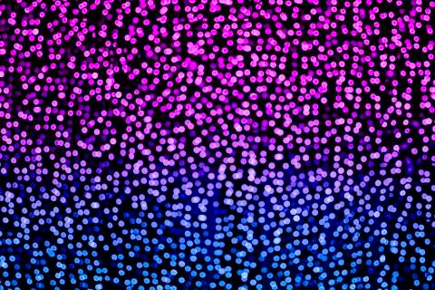 Blurred abstract multicolor background with bokeh, defocused many lights on t Stock Photos