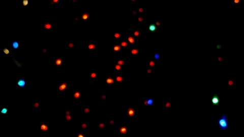 Blurred and deformed close up of red blue lights bokeh on black background. Stock Footage 122197272