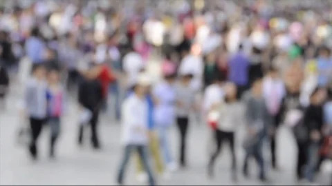 Blurred anonymous crowd in a city, HD video Stock Footage 73663774