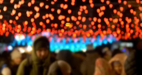 Blurred array of lights with people on the street Stock Footage 123476785