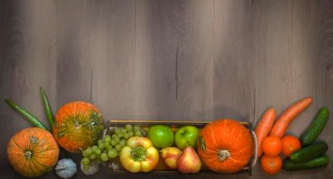 Blurred autumn composition with pumpkins, various vegetables Stock Photos