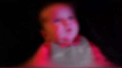 A blurred baby with pink highlights - Soft dreamy effect Stock Footage 153440887