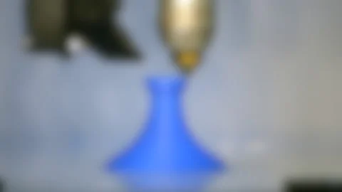 Blurred background. 3d printer printing isolated blue object close-up Stock Footage 134907040