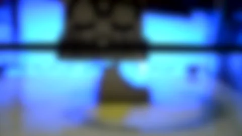 Blurred background. 3D printer prints figure in white plastic on blue background Video stock 137669555