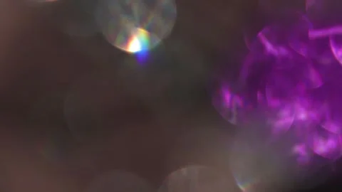 Blurred background and glittering lights of shiny and seven colors Видео 318610426