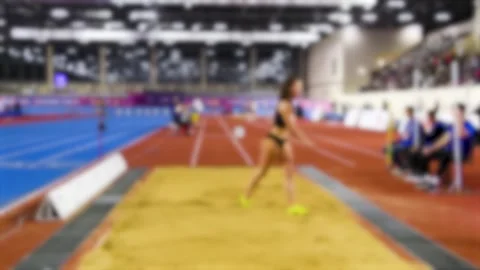 Blurred background of athletics competitions. 스톡 동영상 329870137