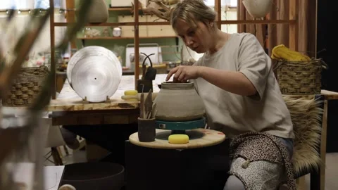 Blurred background, background, blonde designer chooses color palette and brushe Stock Footage 277907531