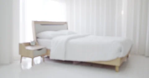Blurred background with bed in bedroom Stock Footage 127082004