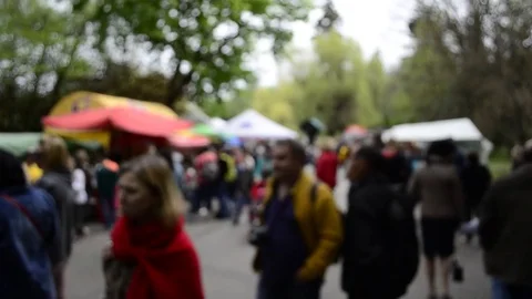 Blurred background. Blurred people walking through a city street. Toned photo. Stock Footage 75546434
