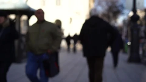 Blurred background. Blurred people walking through a city street Stock Footage 260160427