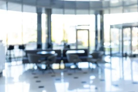Blurred background of a bright and spacious modern office Stock Photos