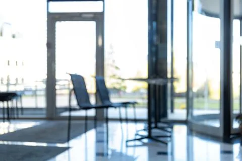 Blurred background of a bright and spacious modern office Stock Photos