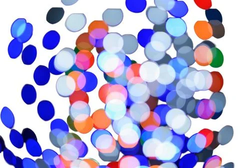 A blurred background with bright circular bokeh lights in blue, purple, and.. Stock Photos