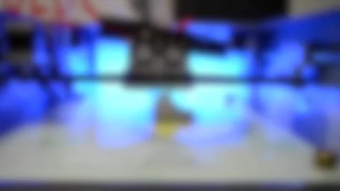 Blurred background. Close-up printing on the printer model 3d white shoes Video stock 137669544