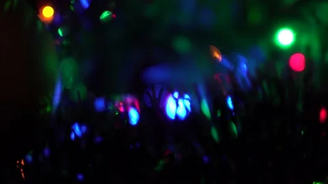 Blurred background . The colored lights of the garland are blinking on the Stock Footage 163091267