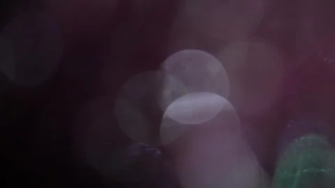 Blurred background with colorful glowing lights overlay Vidéo 318637864