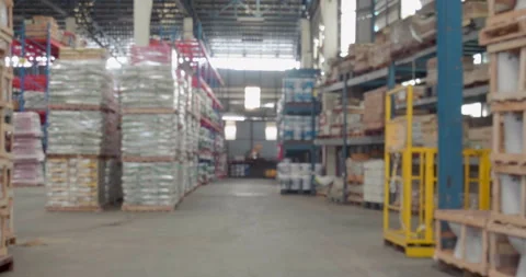 Blurred Background Commercial packaging on steel rack. Video stock 267680403