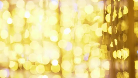 Blurred background. copy space. Golden lights garland with blue flares Stock Footage 145351474