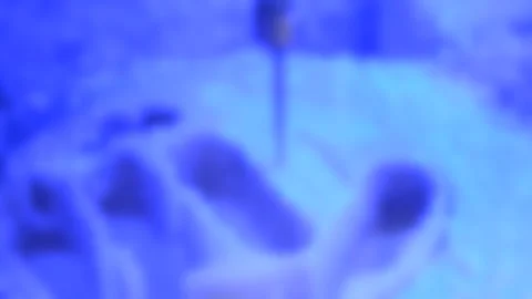 Blurred background. Dental milling machine carving out shape of human teeth Stock Footage 135981688