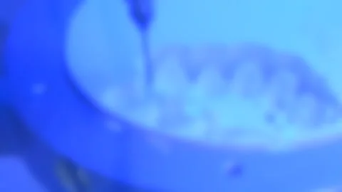 Blurred background. Dental milling machine carving out shape of human teeth Stock Footage 135983137