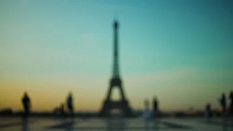 Blurred background Eiffel tower at sunset orange blue sky in Paris during the Stock-Footage 119357225