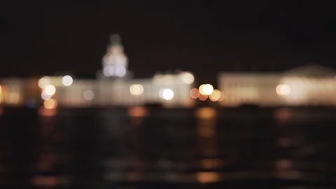 Blurred background from embankment in Saint Petersburg at night grainy shot Stock Footage