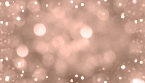 Blurred background with festive lights. Demonstrating color of 2025 year mocha Stock Photos