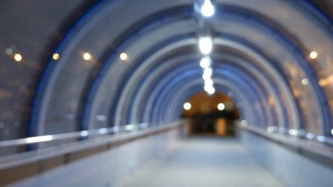 Blurred background. a first-person view, someone passes through a dark pedestria Video stock 106638472