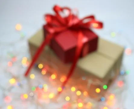Blurred background : Gift boxes with bows on bokeh light Stock Photos