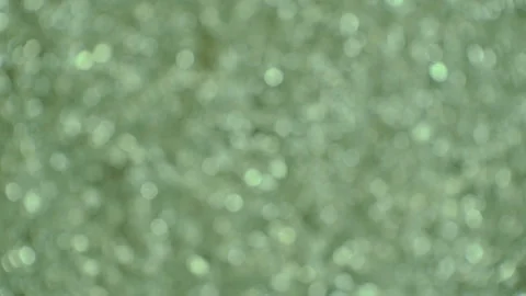 Blurred background in green. Camera movement from left to right. Stock Footage 103941903