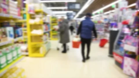Blurred background of grocery store and people in the supermarket Stock Footage 220444682