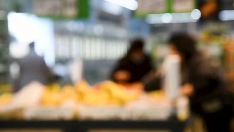 Blurred background of grocery store and people in the supermarket 動画素材 220444693