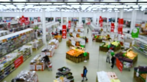 Blurred background of grocery store and people in the supermarket. Top view Stock Footage 238469866
