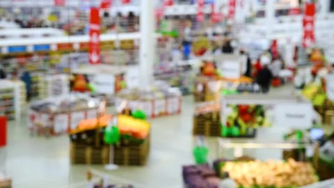 Blurred background of grocery store and people in the supermarket. Top view Stockbeeldmateriaal 239984028