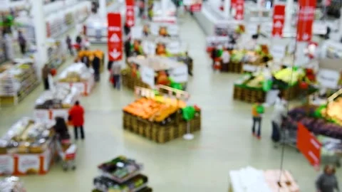 Blurred background of grocery store and people in the supermarket. Top view 動画素材 252520948