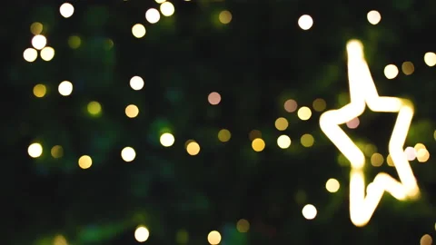 Blurred background of illuminated Christmas tree. Vídeos de archivo 144594337