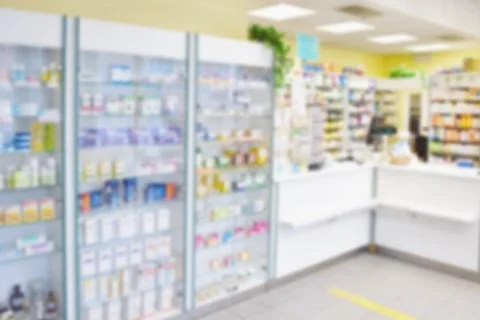 Blurred background. Interior of a pharmacy with goods and showcases. Medicine Foto stock