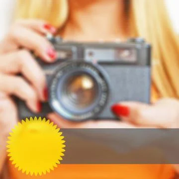 Blurred background lady with camera with web elements Stock Photos
