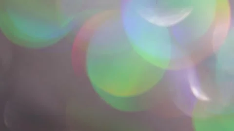 Blurred background with a large glowing prism lights overlay 库存影片 318675740