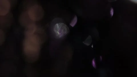 Blurred background, light leaks, slow motion, bokeh, purple color 動画素材 317458467