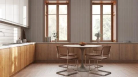 Blurred background, modern japandi kitchen and dining room. Cabinets and di.. Illustrazione stock