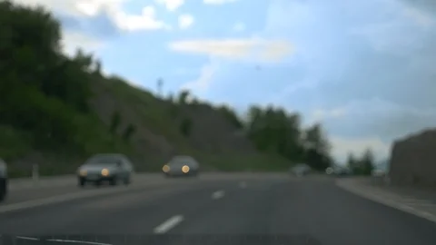 Blurred background. mountain serpentine. view from the car through the Video stock 110882576