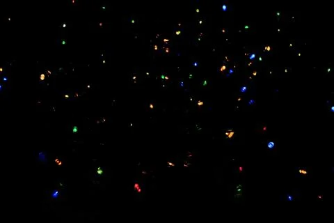 Blurred background, multicolored colored bokeh of the evening city. Stock Photos