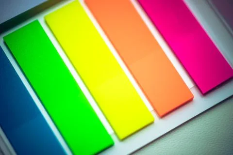 Blurred background multicolored notes in a notebook with a white background. Stock-Fotos