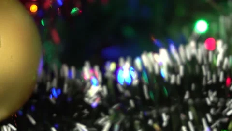 Blurred background .New Year. The colored lights of the garland are blinking on Stock Footage 143877998