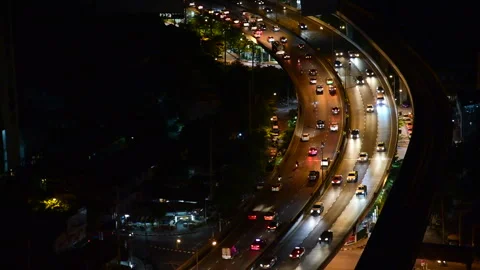 Blurred background night city bokeh car drive on road in nightlife Stockbeeldmateriaal 247426567